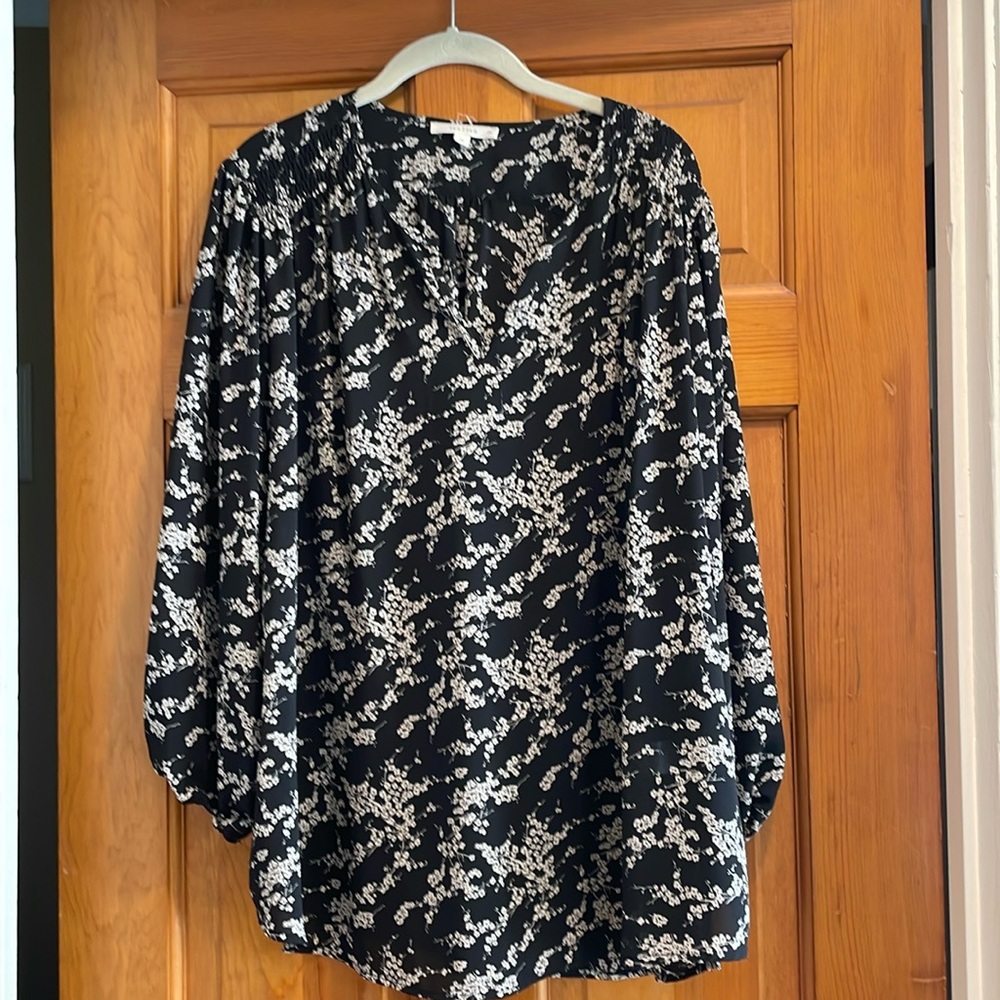 Flowered blouse.